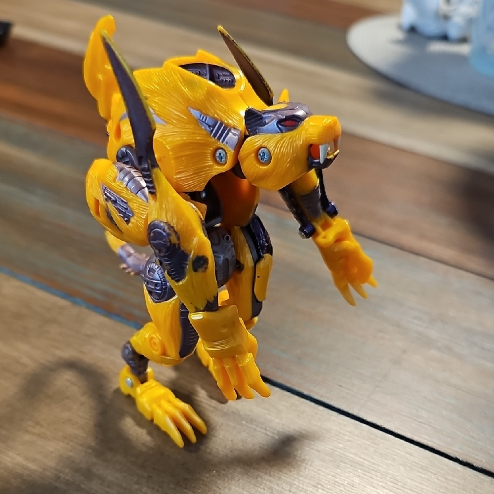 Yellow and Purple Robotic Action Figure